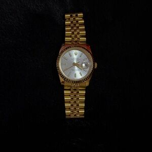 Gold Woman’s Rolex Watch with Pearl White Dial